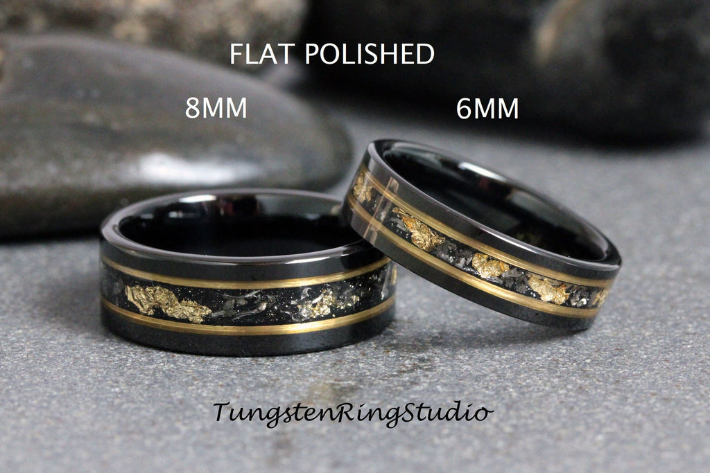 May include: Two black tungsten carbide rings with gold inlay and a flat polished finish. The rings are 8mm and 6mm wide.  FLAT POLISHED is written above the rings.  8MM and 6MM are written below the rings. TungstenRingStudio is written below the rings.