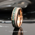 May include: A rose gold tungsten carbide ring with a green and white inlay. The ring has a polished finish and a beveled edge.