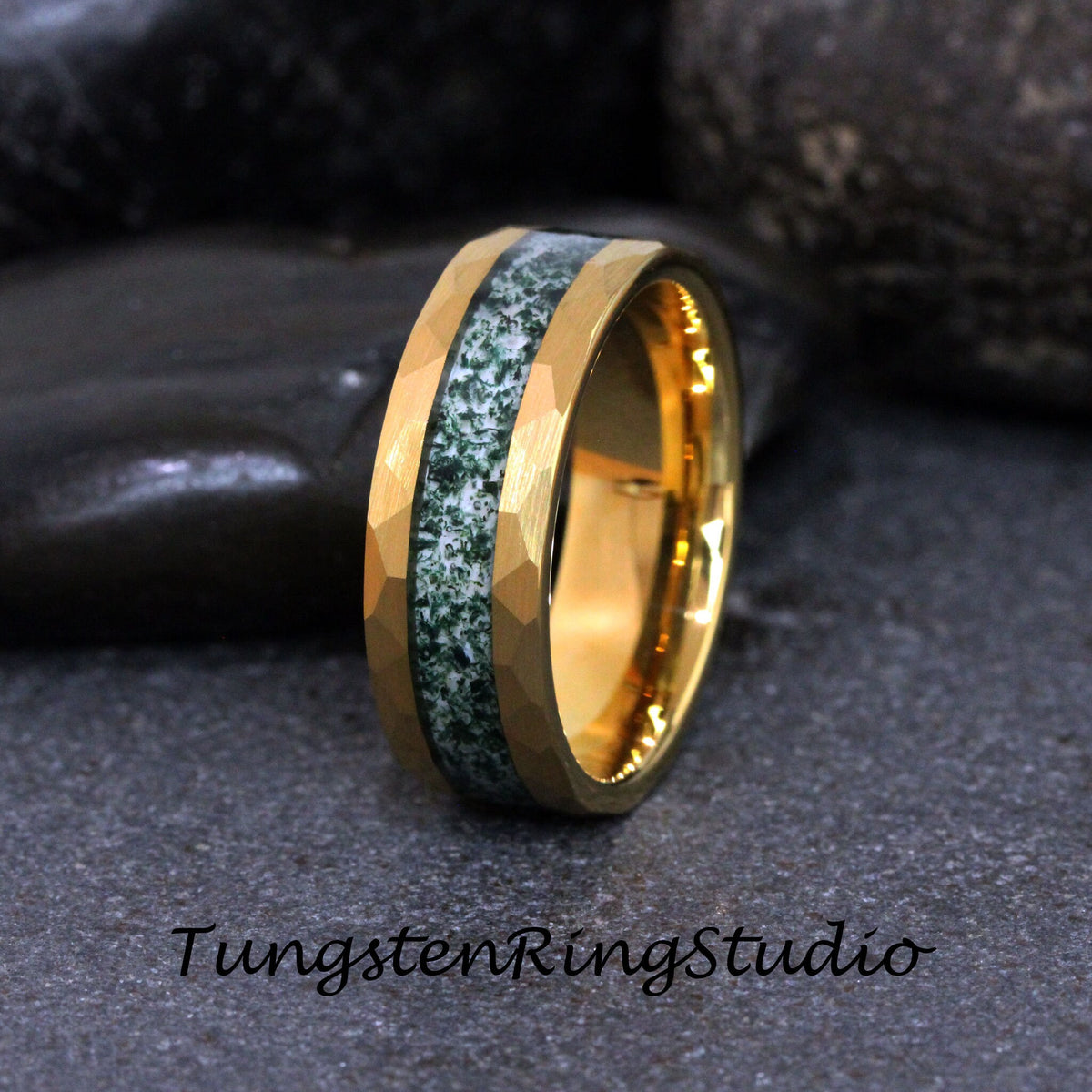 May include: A gold tungsten carbide ring with a green and white inlay. The ring has a hammered finish.
