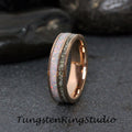 May include: A rose gold tungsten carbide ring with a white opal inlay and a row of small diamonds.